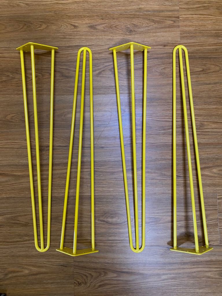 Grid table top with yellow hairpin legs