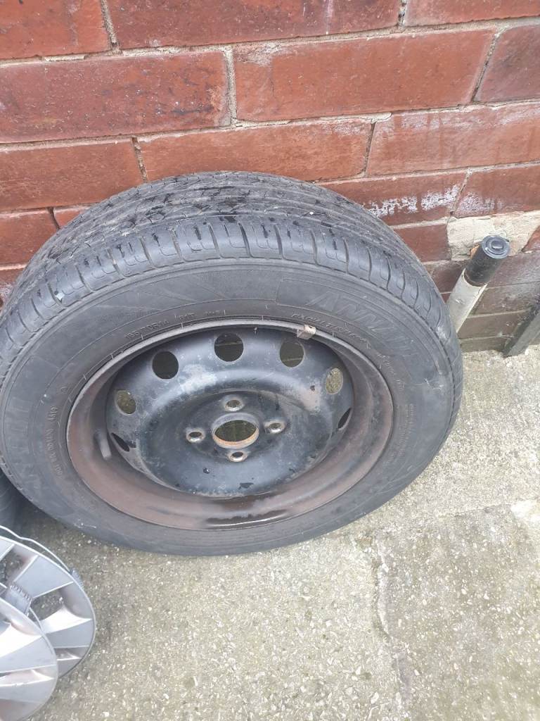 4 wheels and tyres plus wheel trims