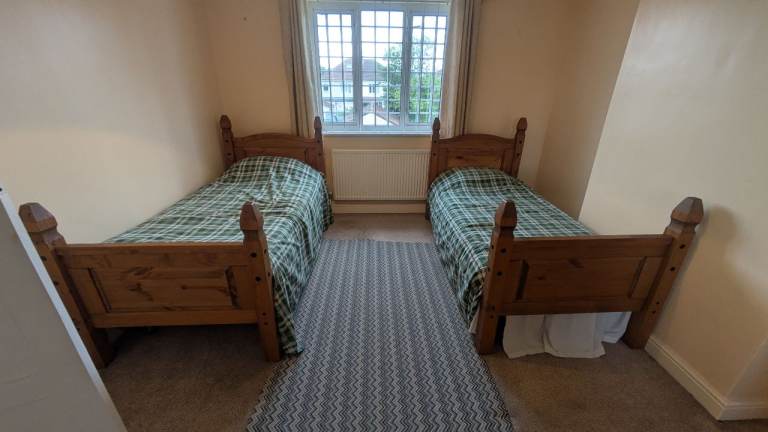 2 Single wooden beds and mattresses