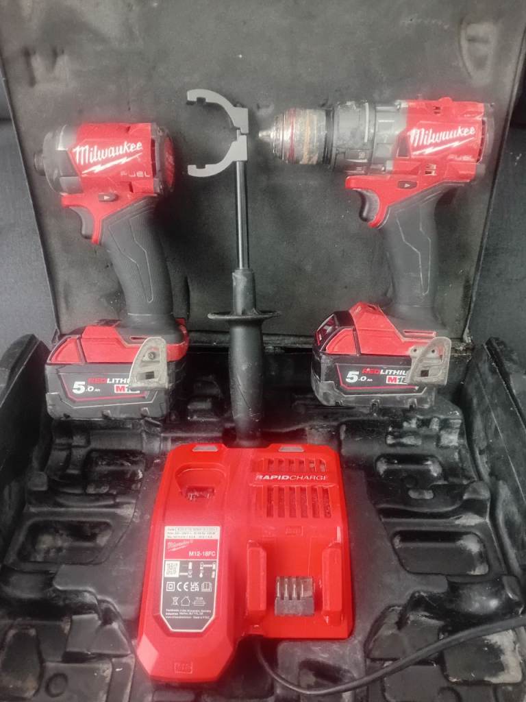 Milwaukee m18 twin pack impact driver combi drill 2x 5.ah batteries 