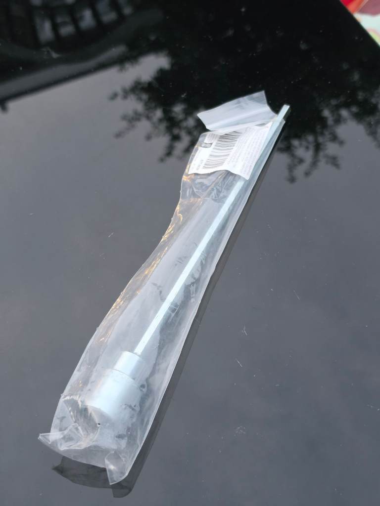 Long Metal Socket Extension Tool in Sealed Packaging