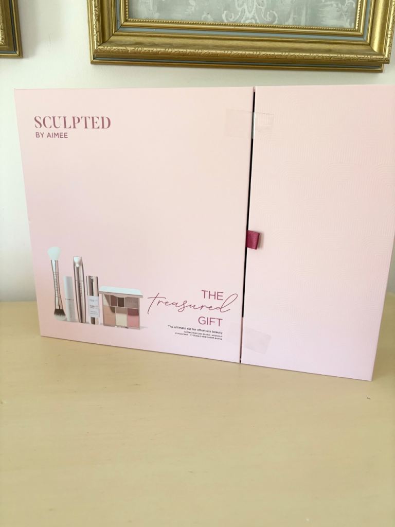 Sculpted by Aimee The Treasured Gift Set, which contains five full-sized beauty products and a brush
