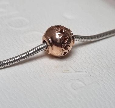image for Genuine Pandora Essence Rose Gold caring bead.