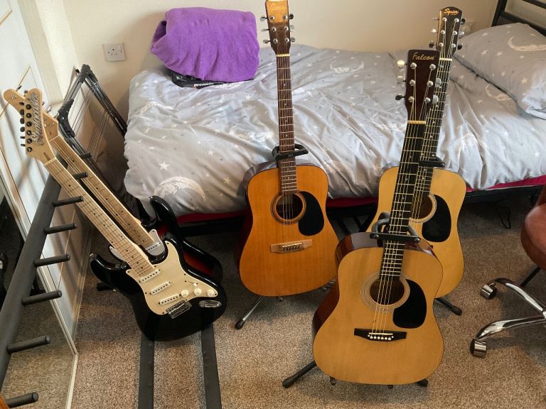 Acoustic and Electric Guitars all in good working condition 