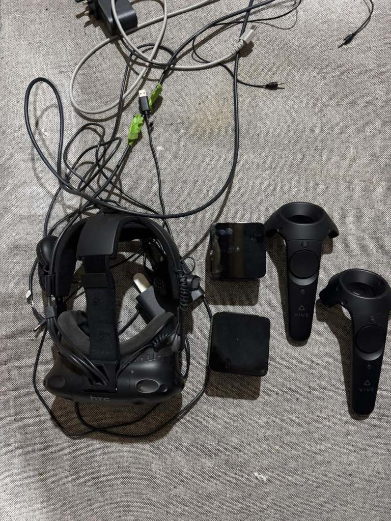 HTC Vive Virtual Reality Headset with Controllers and Base Stations