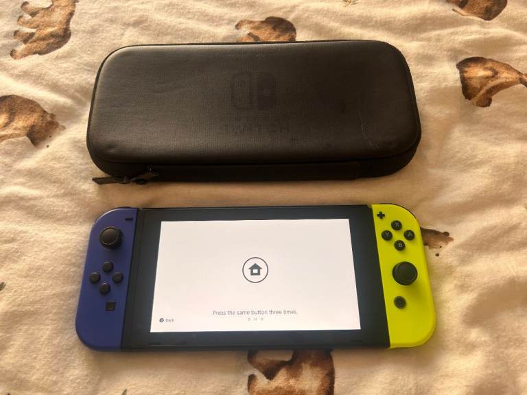 Nintendo Switch™ AND 5 GAMES - Newer Model with Brand New Joy-Cons AND CASE