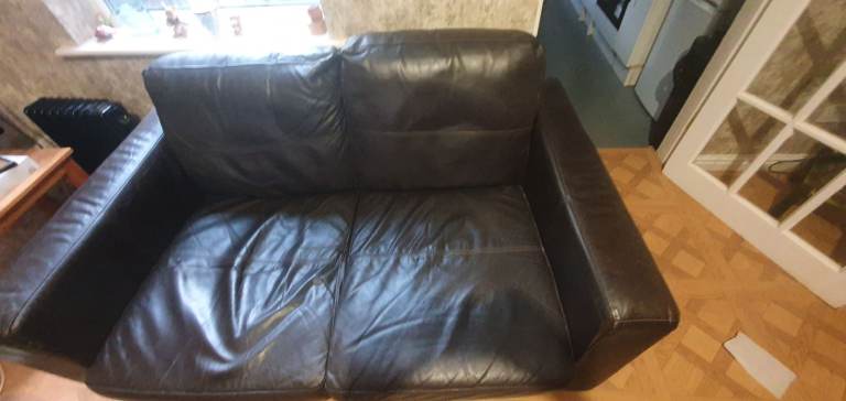 Two-Seater Brown Leather Sofa – Good Condition