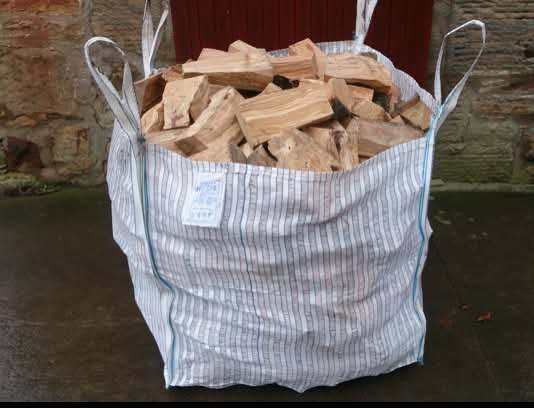 Seasoned hardwood logs with free delivery 1ton builders bag £60 2 bags £110 4 bags £180