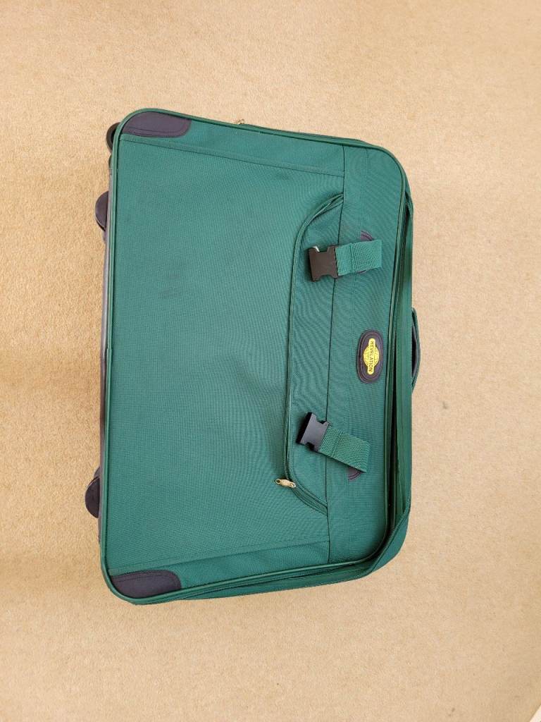Revelation  large suitcase  pull along 2 wheel