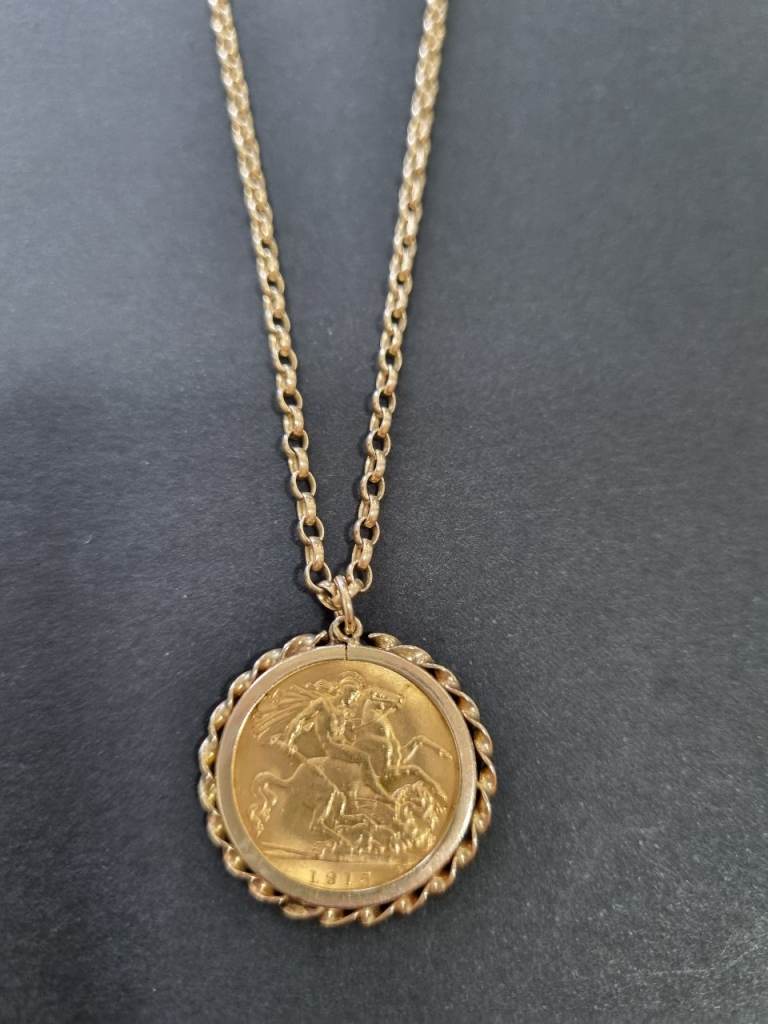 1915 half sovereign pendant and 9ct belcher chain