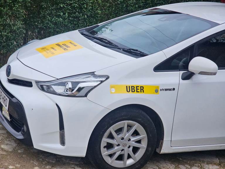 Private hire Manchester plated Toyota Prius plus for sale.