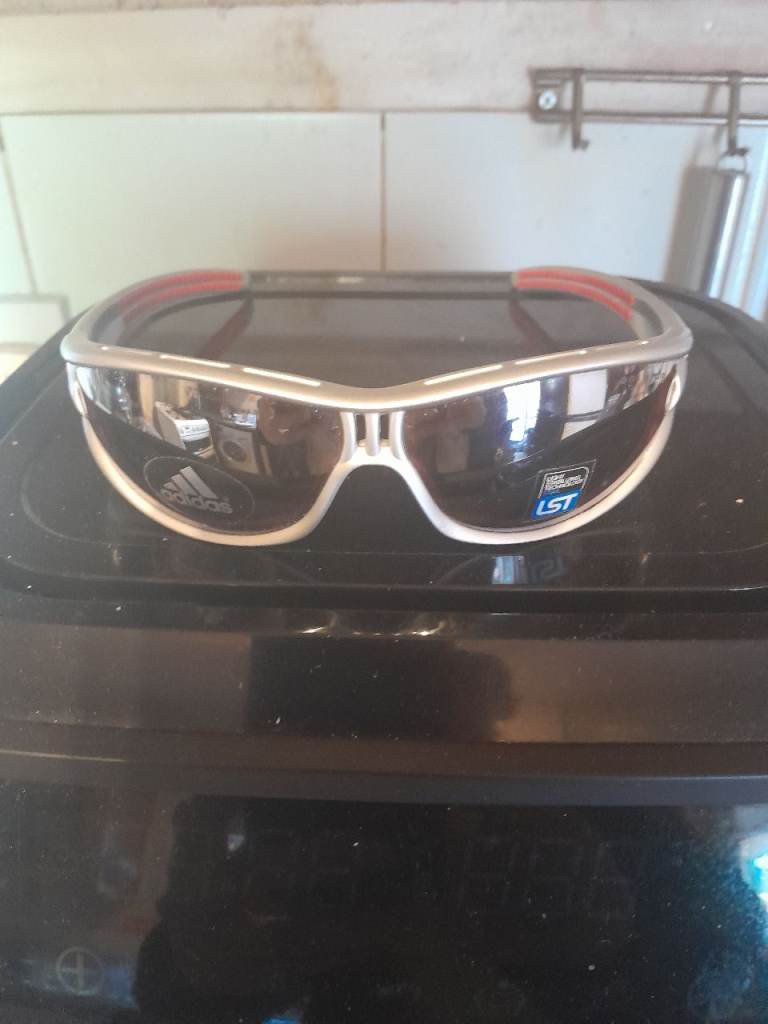 Adidas sunglasses brand new cost £189