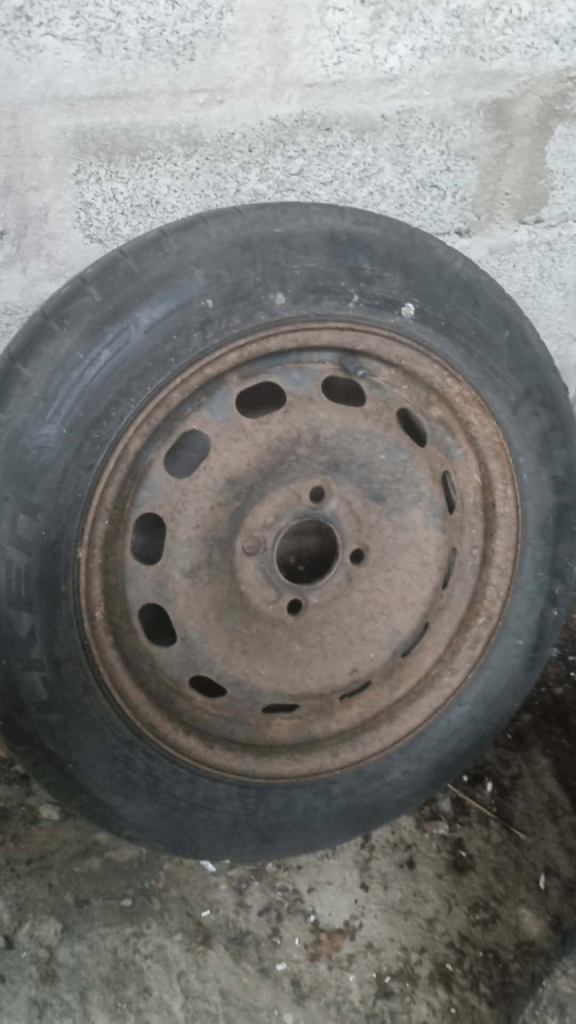 Ford transit courier rims with four good tyres 