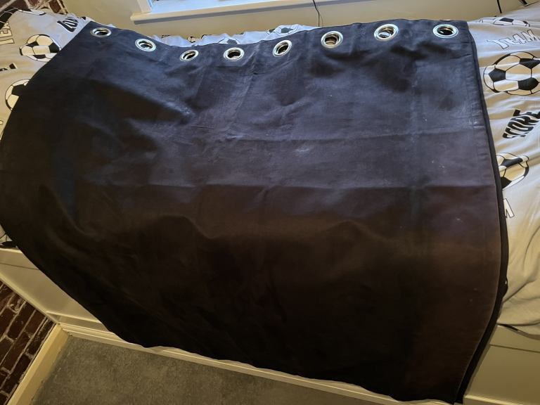 Black eyelet top blackout curtains 117cm wide x 136cm long