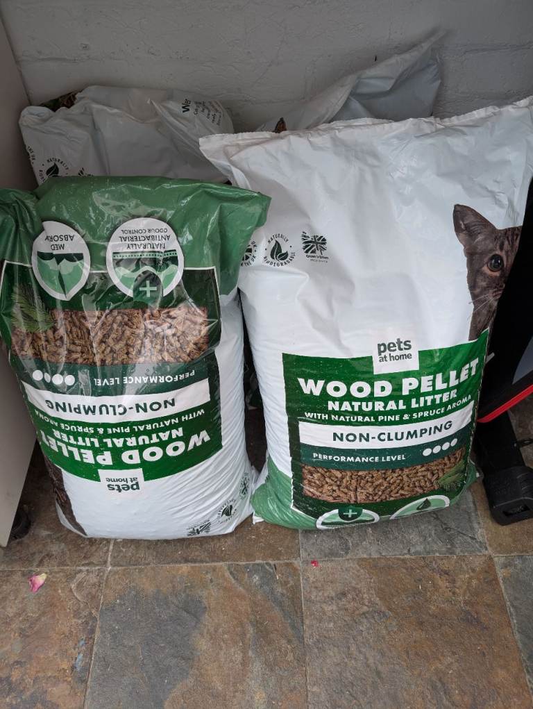 Four 30L bags of wood pellet cat litter 