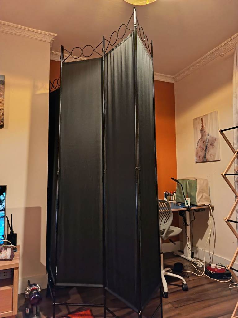 Tall black fabric and metal screen 