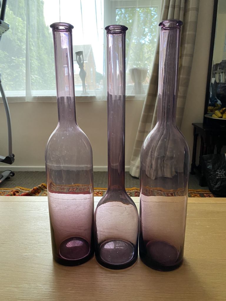 3 large decorative vases/bottles in purple 