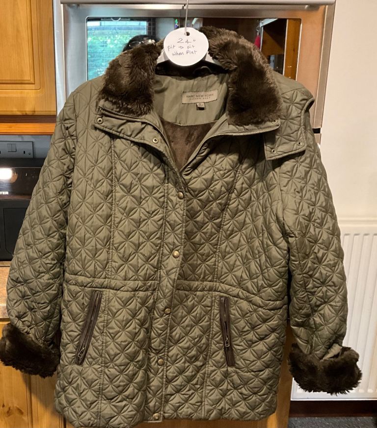 ANDREW MARK OF NEW YORK ladies coat size XL about 24 inches pit-pit when flat.
