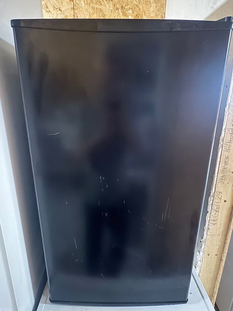 Compact Black Fridge Freezer with Integrated Icebox