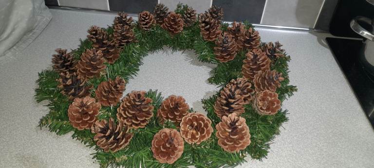 Christmas artificial pine wreath with real pine cone wreath approx  18 in diameter 