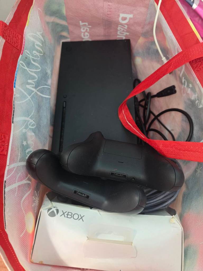 Xbox One X Console with three Controllers – Good Condition