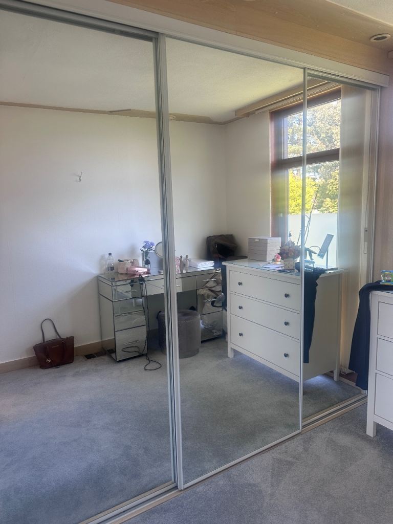 Mirror sliding wardrobe doors