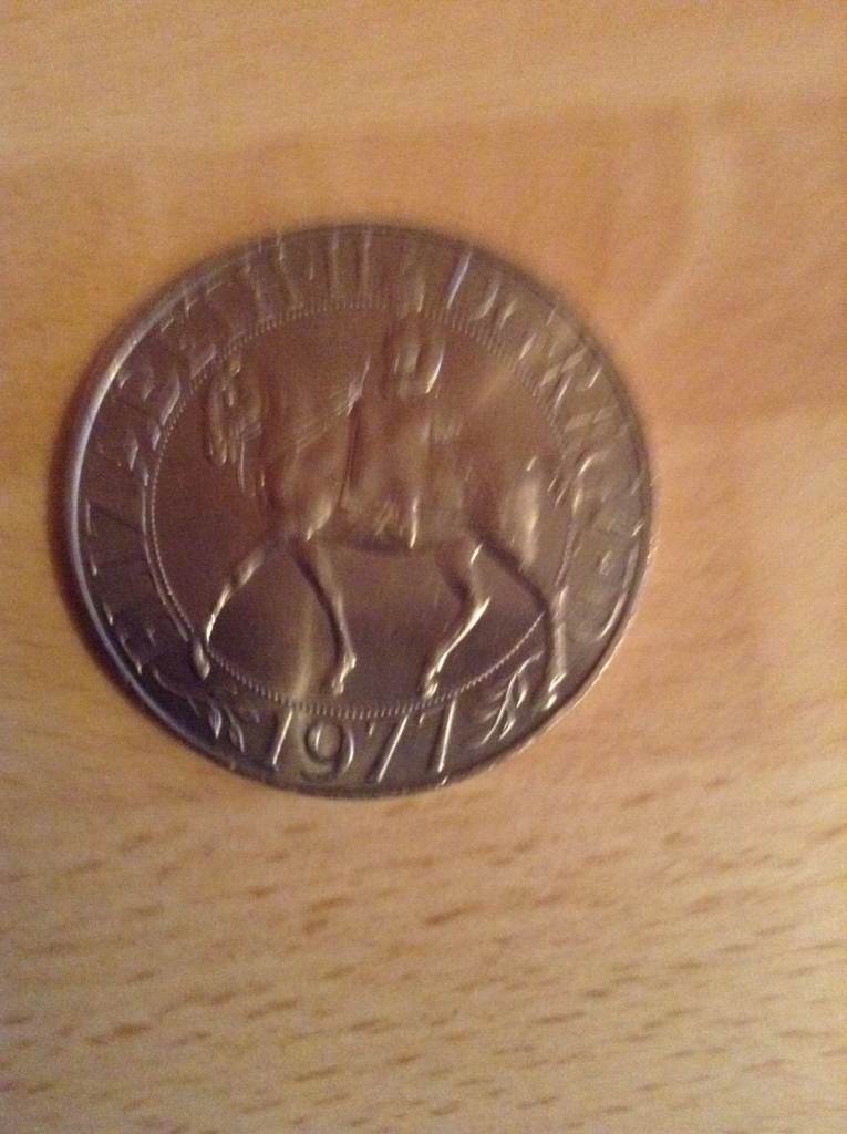 A 1977 Queen Elizabeth 11 Silver Anniversary Commemorative Crown Coin
