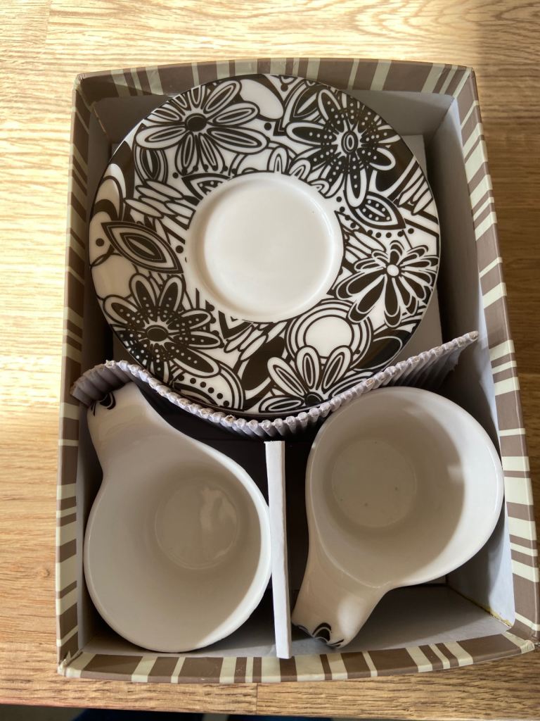 Set of espresso coffee cups and saucers