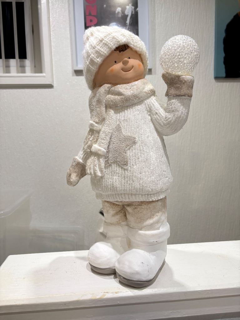 Charming White Winter Boy Figurine with Light-Up Snowball