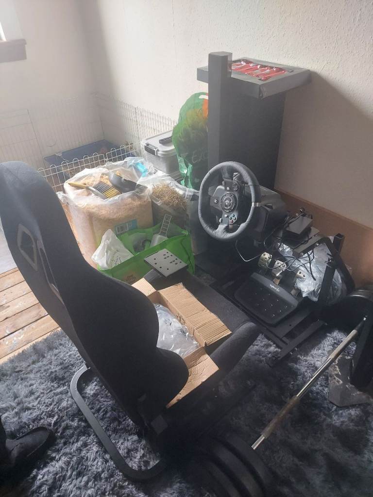 100 percent stainless steel Logitech wheel peddles and gaming chair