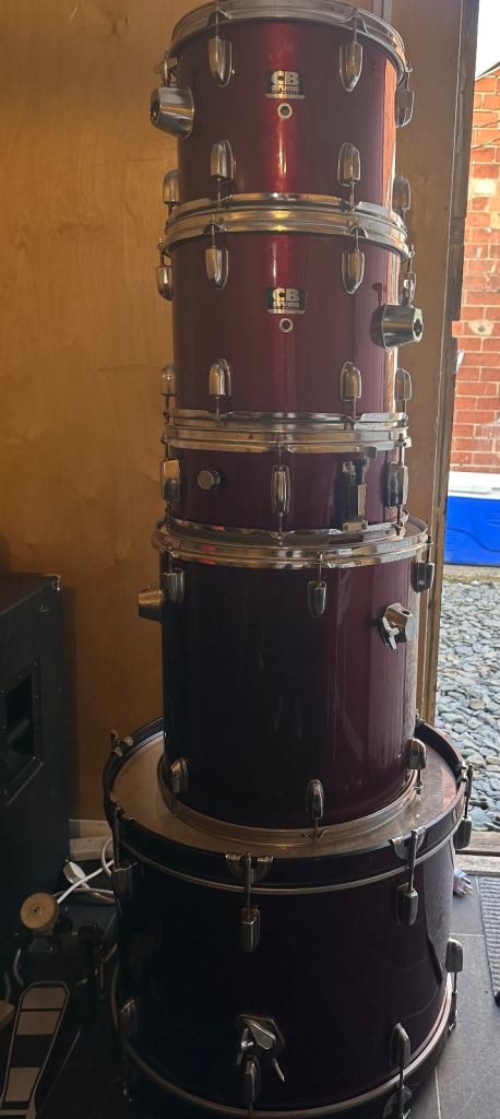 CB Drums acoustic drum kit in burgundy with Cymbals and some hardware 