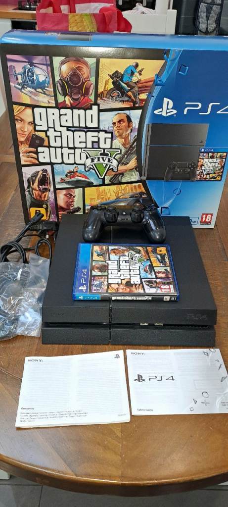 PS4 Slim 500GB Console with orginal packaging.