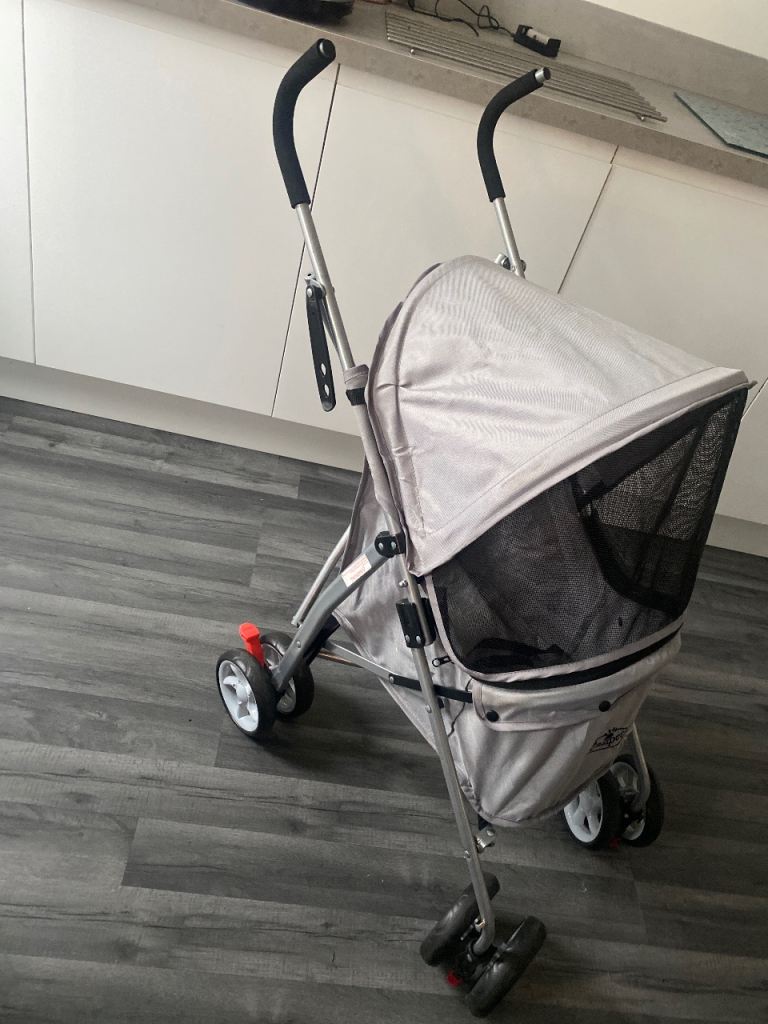 Gray dog pram 