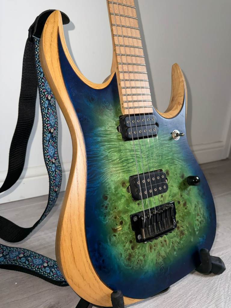 Discontinued (in 2019) IBANEZ RGD IX MBP Iron Label Surreal Blue Burst Guitar.