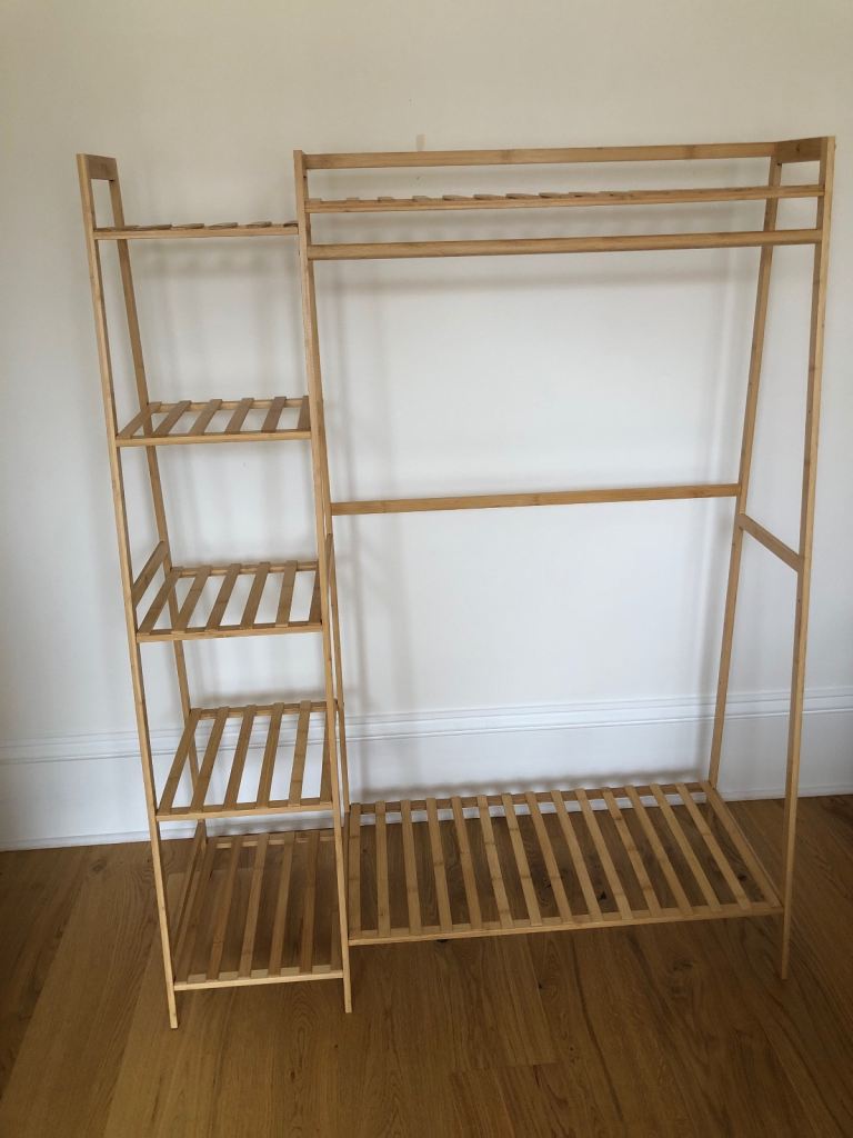 Clothes hanging with shelves