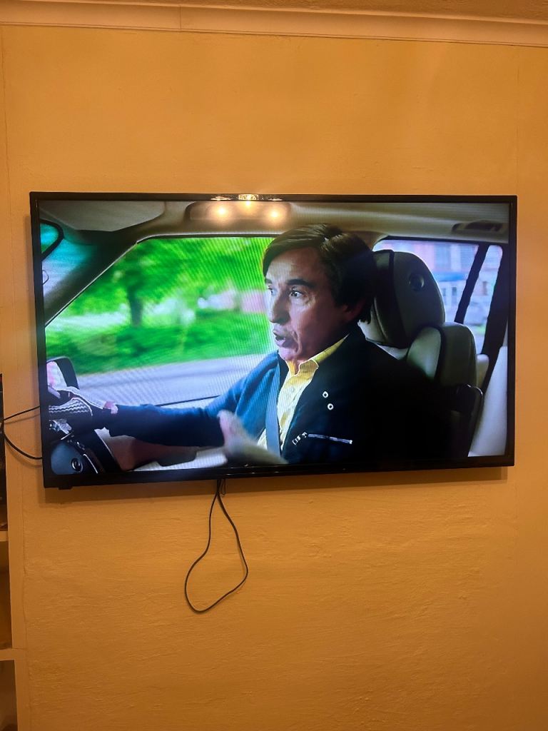 52 inch Black Flat Screen TV with Remote and Wall Mount – Good Condition