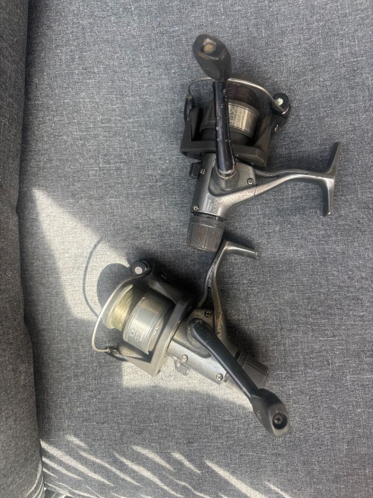 2 shimano catana 1000 reels