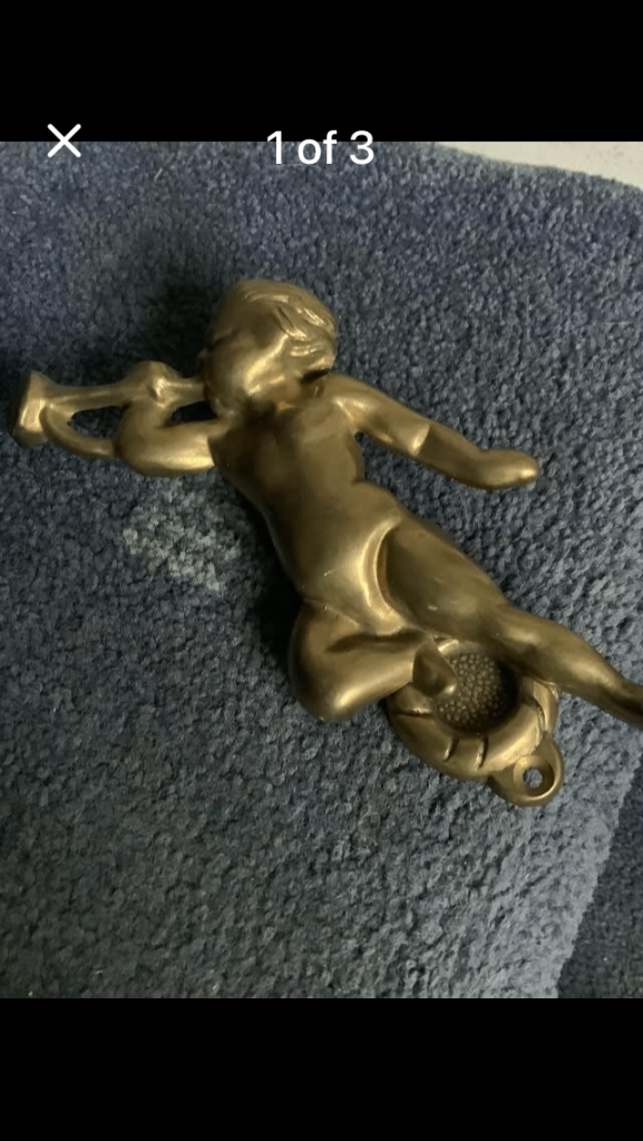 Brass cherub door knocker