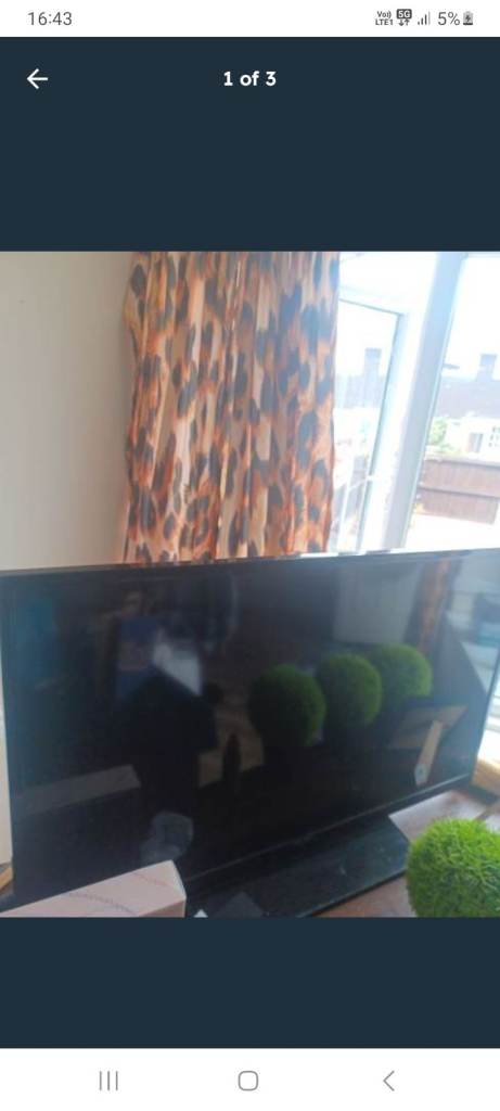 Black Flat Screen TV – Good Condition