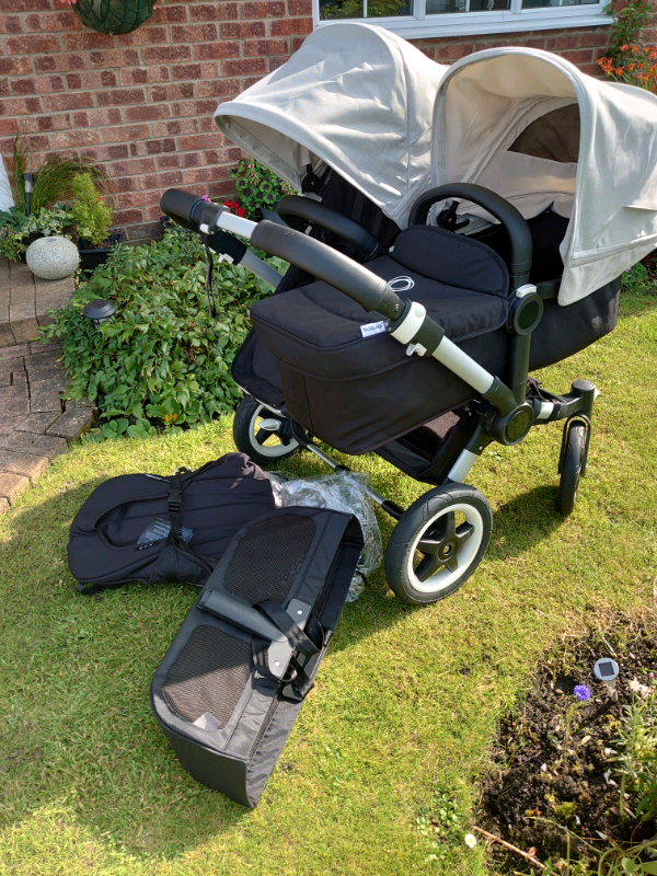 REDUCED Bugaboo Donkey Duo with Brand New Misty White Hoods