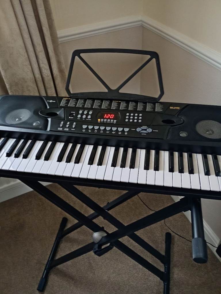 Musical keyboard and brand new stand 