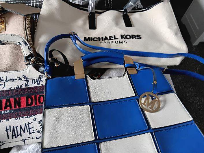 ladies hand bags open to offers excellent condition 