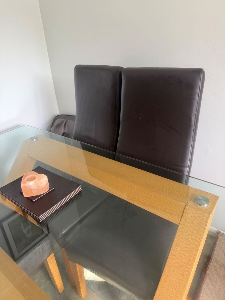 Glass Top Dining Table with 4 Brown Leather Chairs – Good Condition