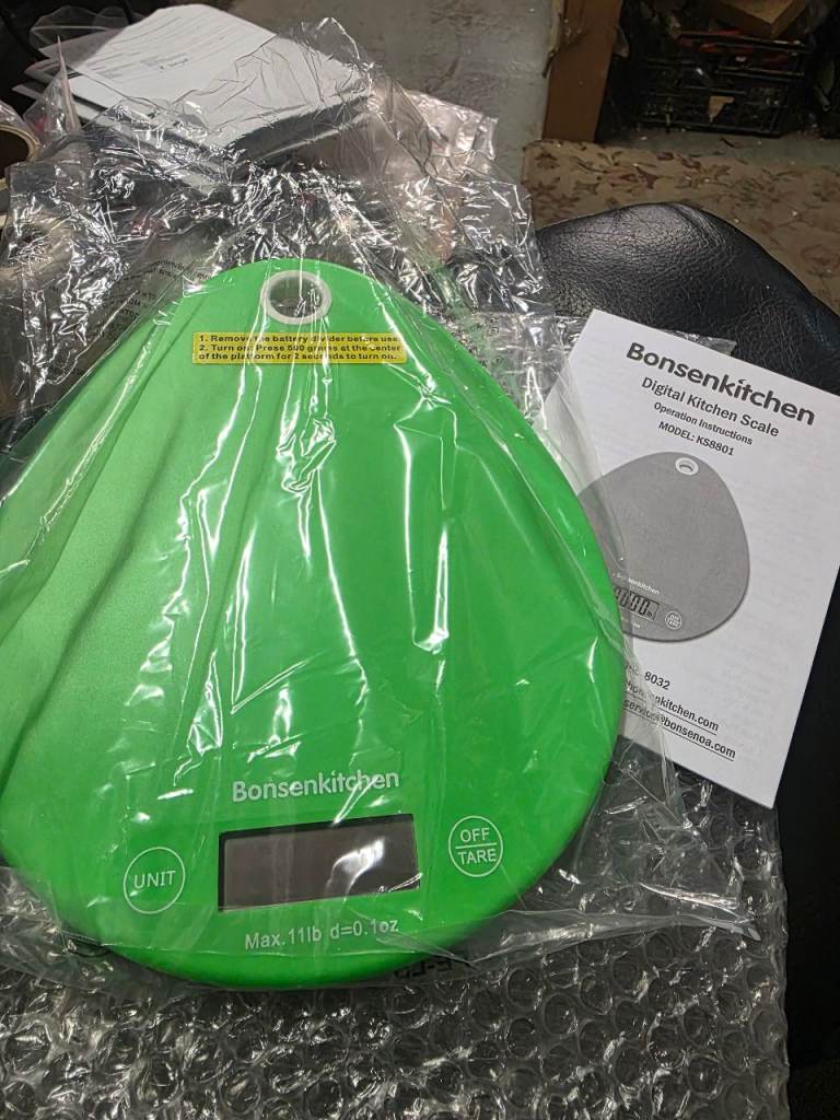 A new still boxed lime green slim kitchen digital scale. 