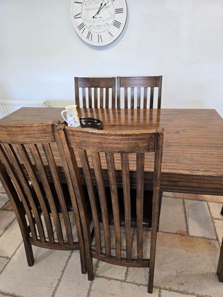  Dining Table and 4 Chairs – Good Condition