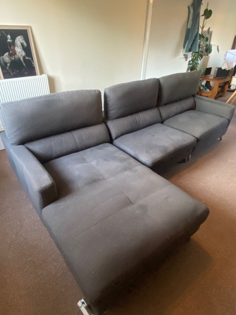 Charcoal grey corner couch. 