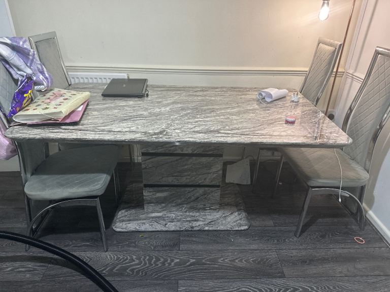Marble dining table with 4 chairs. Grey 
