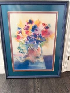 Blue framed picture of flowers