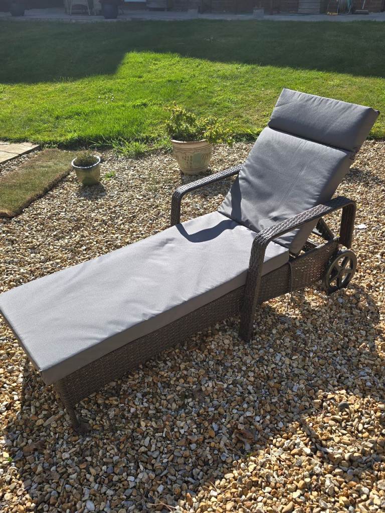 Garden rattan lounger