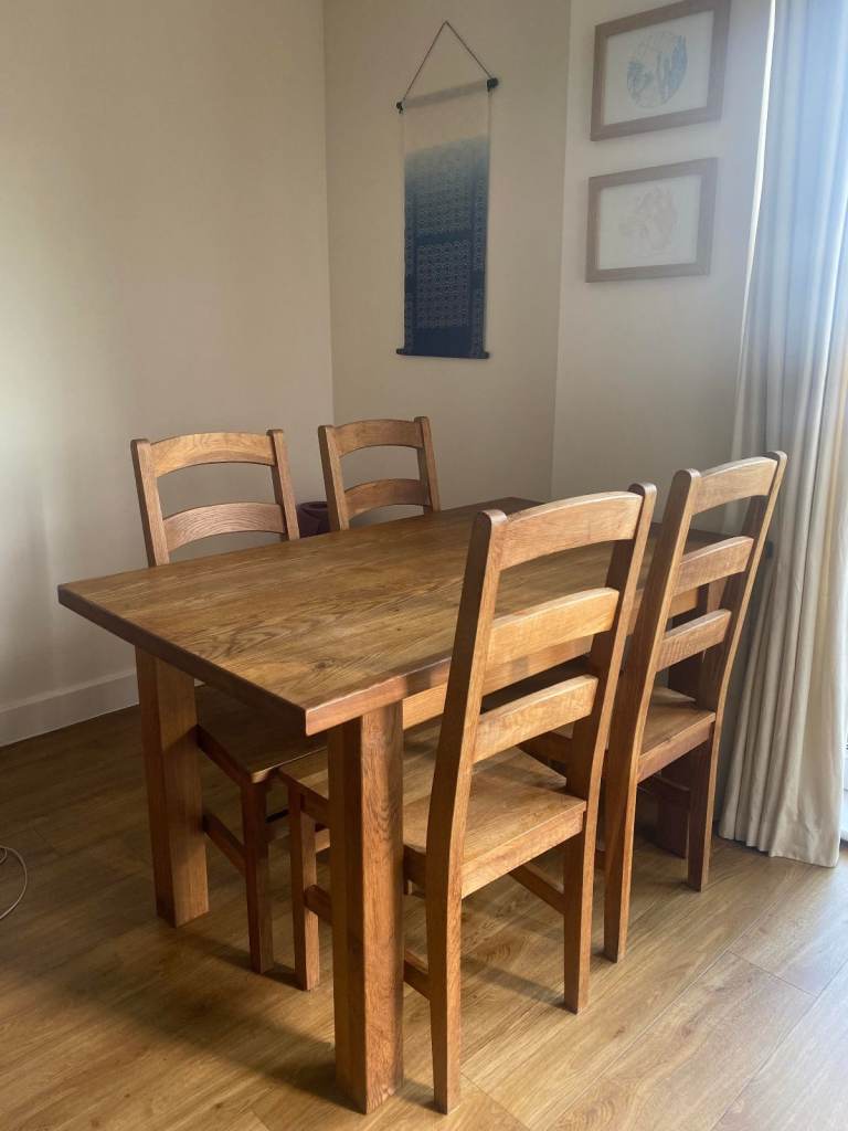 Wooden dining table and 6 chairs